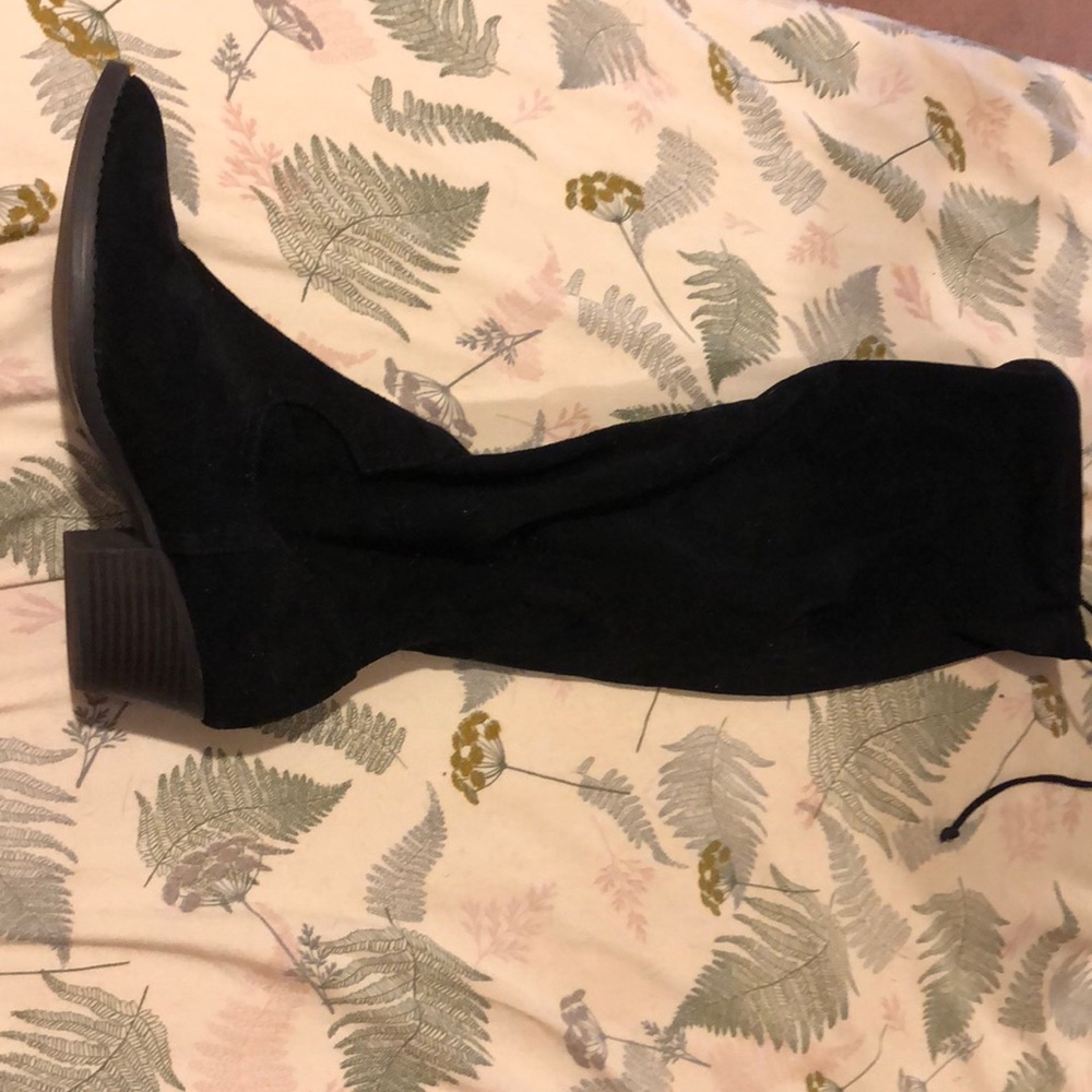 Pair of black thigh high boots